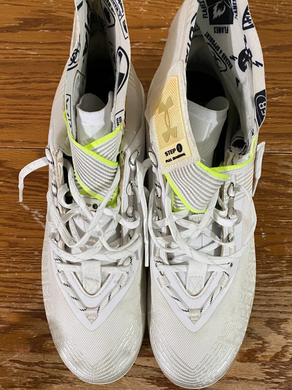 Under Armour men's White Cleats with Neon Yellow Highlights